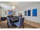 Dining area with eye-catching lighting and tile flooring detail at 2328 W Calle Marita --, Phoenix, AZ 85085