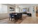 Well-lit dining room with modern light and elegant plaid chairs at 2328 W Calle Marita --, Phoenix, AZ 85085