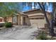 Charming single-story home with desert landscaping, stone accents, and a two-car garage at 2328 W Calle Marita --, Phoenix, AZ 85085