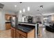 Spacious kitchen with stainless steel appliances and island seating at 2328 W Calle Marita --, Phoenix, AZ 85085