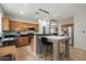 Kitchen with bar seating island, stainless appliances, and ample counter space at 2328 W Calle Marita --, Phoenix, AZ 85085