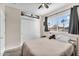 Cozy bedroom with natural light, closet, and comfortable furnishings, creating a relaxing and inviting space at 2440 E Stephens Pl, Chandler, AZ 85225