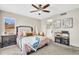 Spacious main bedroom features a ceiling fan, large window and carpeted floors at 2440 E Stephens Pl, Chandler, AZ 85225