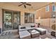 Relaxing covered patio with cozy seating and a view of the backyard at 2440 E Stephens Pl, Chandler, AZ 85225