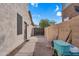 Practical side yard with a gated entrance and ample space for storage at 2440 E Stephens Pl, Chandler, AZ 85225