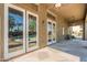 A spacious back patio with french doors leading to the pool is perfect for outdoor living at 2735 E Flower Ct, Gilbert, AZ 85298