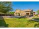 Expansive backyard features a basketball court, and lush greenery at 2735 E Flower Ct, Gilbert, AZ 85298