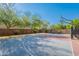 Outdoor basketball court with trees and a blue sky at 2735 E Flower Ct, Gilbert, AZ 85298