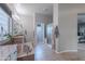 Bright bathroom with double sinks, granite counters, soaking tub, walk-in shower, and view to bedroom at 2735 E Flower Ct, Gilbert, AZ 85298