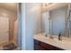 Bathroom featuring a vanity with drawers, sink, mirror, and shower/tub combination at 2735 E Flower Ct, Gilbert, AZ 85298