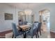 Dining room features modern chandelier and stylish decor, as well as view into other rooms at 2735 E Flower Ct, Gilbert, AZ 85298
