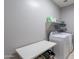 Practical laundry room with modern appliances and ample counter space at 2735 E Flower Ct, Gilbert, AZ 85298