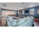 Spacious seating area with a billiard table and mounted televisions at 2735 E Flower Ct, Gilbert, AZ 85298