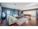 Open floor plan with comfortable seating and a billiard table for entertaining at 2735 E Flower Ct, Gilbert, AZ 85298