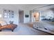 Main bedroom featuring a seating area and a view to en-suite bathroom at 2735 E Flower Ct, Gilbert, AZ 85298