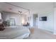 Large main bedroom featuring a canopy bed, a ceiling fan, and wall mounted tv at 2735 E Flower Ct, Gilbert, AZ 85298
