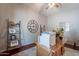 Well-appointed office featuring wooden desk, decorative shelves, and soft lighting for a serene work environment at 2735 E Flower Ct, Gilbert, AZ 85298