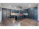 Spacious office featuring custom cabinetry, built-in shelving, and a stylish workspace at 2735 E Flower Ct, Gilbert, AZ 85298