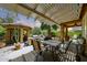 Outdoor area featuring covered patio with barbecue, perfect for entertaining and relaxation at 30248 W Earll Dr, Buckeye, AZ 85396