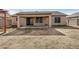 View of backyard and covered patio of home at 3029 N 83Rd Ln, Phoenix, AZ 85037