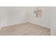 Neutral bedroom with wood-look tile flooring at 3029 N 83Rd Ln, Phoenix, AZ 85037