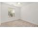 Bedroom featuring a ceiling fan and window at 3029 N 83Rd Ln, Phoenix, AZ 85037