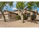 Attractive single-story home featuring a two-car garage, neutral paint, stone accents and tidy landscaping at 3029 N 83Rd Ln, Phoenix, AZ 85037