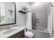 Bright bathroom featuring framed mirror, granite countertop, and shower-tub combo at 3437 E Appaloosa Rd, Gilbert, AZ 85296