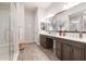 Bathroom features double sink vanity with lots of counter space and glass enclosed shower at 3437 E Appaloosa Rd, Gilbert, AZ 85296