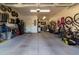 Spacious and well-lit garage with ample storage and room for multiple vehicles and work area at 3437 E Appaloosa Rd, Gilbert, AZ 85296