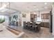 Open-concept kitchen featuring a central island with bar seating and stainless-steel appliances at 3437 E Appaloosa Rd, Gilbert, AZ 85296