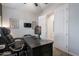 Office space with dark wood desk, a comfortable chair, and natural light at 3437 E Appaloosa Rd, Gilbert, AZ 85296