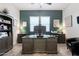 The office provides a quiet workspace with a large desk and lots of storage at 3437 E Appaloosa Rd, Gilbert, AZ 85296