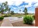 Beautiful courtyard with seating and views of the lush green golf course and scenic mountain backdrop at 3600 N Hayden Rd # 3405, Scottsdale, AZ 85251