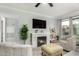 Inviting living room with a cozy fireplace and comfortable seating area at 3600 N Hayden Rd # 3405, Scottsdale, AZ 85251