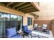 Private outdoor patio with an overhang, outdoor furniture, and a desert view at 3600 N Hayden Rd # 3405, Scottsdale, AZ 85251