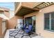 Private outdoor patio space with an overhang, outdoor furniture, and a small garden view at 3600 N Hayden Rd # 3405, Scottsdale, AZ 85251