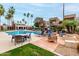 Resort-style pool area with comfortable lounge seating and well-manicured landscaping at 3600 N Hayden Rd # 3405, Scottsdale, AZ 85251