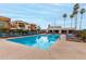 Sparkling community pool with comfortable lounge chairs and well-maintained landscaping at 3600 N Hayden Rd # 3405, Scottsdale, AZ 85251
