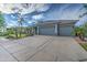 Well-maintained home with a three-car garage, desert landscaping, and a neutral color scheme at 3736 E Cotton Ct, Gilbert, AZ 85234