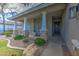 Charming front porch with stone accents, desert landscaping, and a welcoming entrance at 3736 E Cotton Ct, Gilbert, AZ 85234