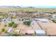 An aerial view of a spacious desert property with many different buildings and desert landscaping at 37508 N 12Th St, Phoenix, AZ 85086