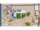 Aerial perspective of the property highlighting a pool, the main house, and equestrian facilities at 37508 N 12Th St, Phoenix, AZ 85086