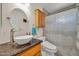 Bathroom with vessel sink, granite countertop, and decorative shower curtain at 37508 N 12Th St, Phoenix, AZ 85086