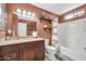 Bathroom with updated vanity, granite countertops, and shower-tub combination at 37508 N 12Th St, Phoenix, AZ 85086