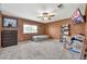 Bedroom featuring a window, a ceiling fan, and plenty of space at 37508 N 12Th St, Phoenix, AZ 85086