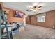 Bedroom with ceiling fan, large window, and ample space at 37508 N 12Th St, Phoenix, AZ 85086