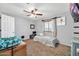 Cozy bedroom featuring a ceiling fan, window, and comfortable single bed at 37508 N 12Th St, Phoenix, AZ 85086
