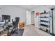 Bedroom with a desk and chair, and storage shelf at 37508 N 12Th St, Phoenix, AZ 85086