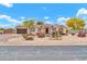 Charming single-story home featuring desert landscaping, arched entryway, and a two-car garage at 37508 N 12Th St, Phoenix, AZ 85086